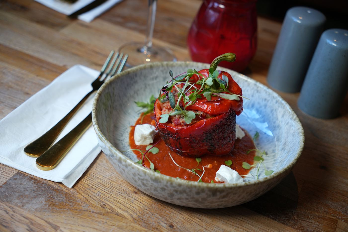 Roasted stuffed pepper on tomato sauce, from the Verona festive menu